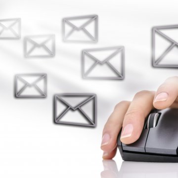 hand on mouse mail envelopes email marketing